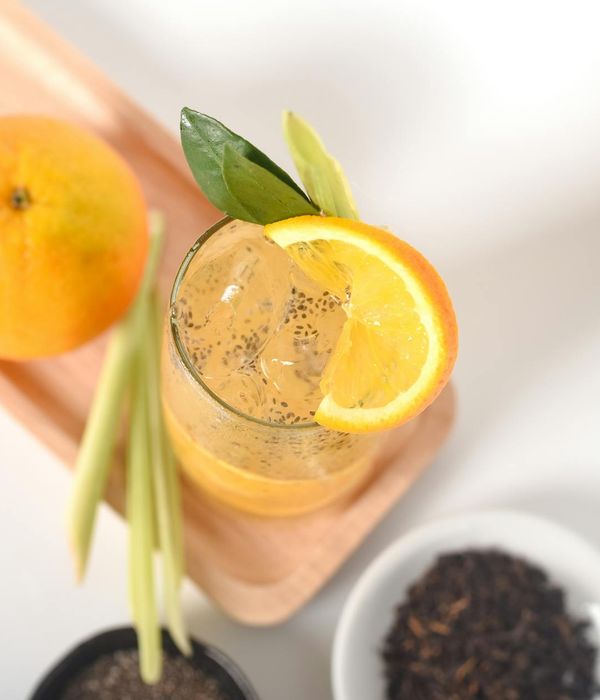 Woman feeling energized and refreshed in a bright, natural setting.